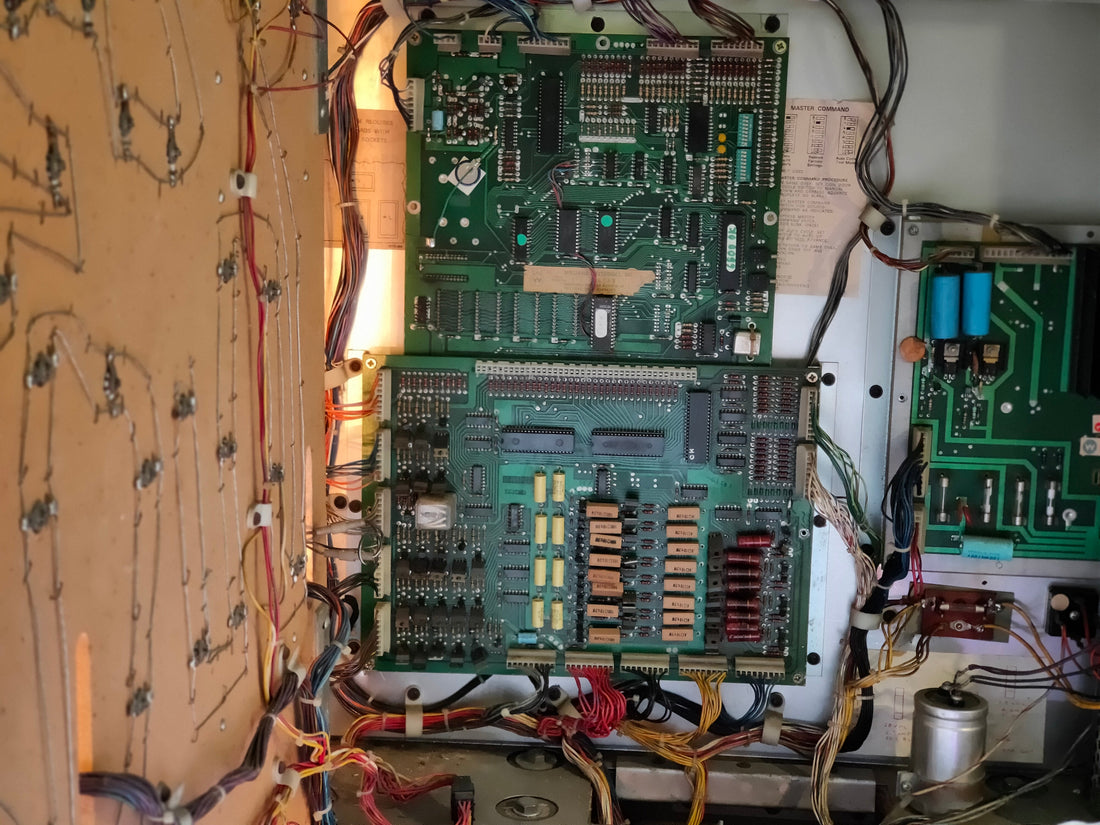 Original Williams CPU and driver boards from a Flash pinball machine, with an added lithium battery and modified EPROMs